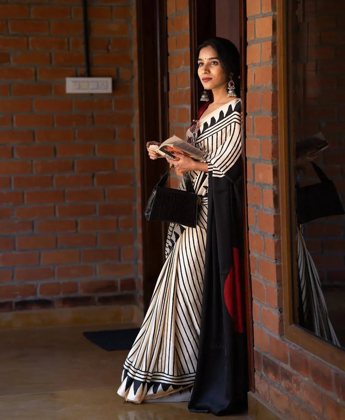 Artisan Saree Crafted in Semi Gaji Silk with Ajrakh Bandhej Patterns