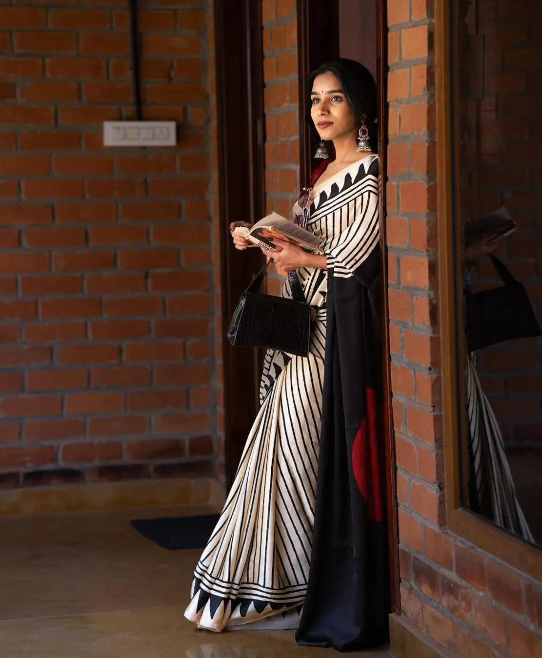 Artisan Saree Crafted in Semi Gaji Silk with Ajrakh Bandhej Patterns